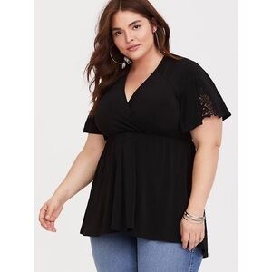 E020 Torrid Lace Sleeve Studio Knit Babydoll Top Black
